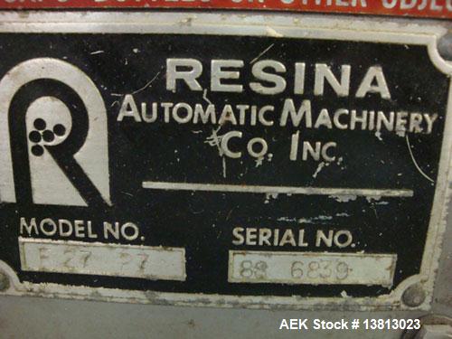 Used Resina Model F27 27 Fitment Applicator. Sorts and feeds fitments to be snapped into filled bottles such as spices. Previously running 43mm closures.