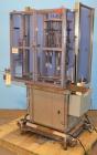 Used Consolidated Capem Model C4HB 8 Head Rotary Cap Press with Star Wheel Infeed and Discharge.