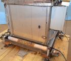 Used Consolidated Capem Model C4HB 8 Head Rotary Cap Press with Star Wheel Infeed and Discharge.