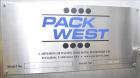 Used Pack West Model In-Line VS Snap Capper/Dose Cup Applicator.