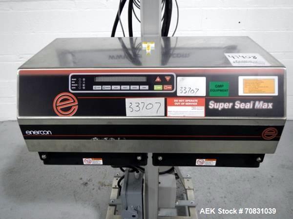 Used Enercon Super Seal Max Model LM4989-02 Induction Sealer. 2.5" Wide x 28" long seal section, 240 volt, serial# C25570-03, new 2011. 4KW Unit