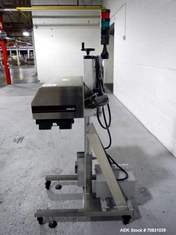 Used Enercon Super Seal Max Model LM4989-02 Induction Sealer. 2.5" Wide x 28" long seal section, 240 volt, serial# C25570-03, new 2011. 4KW Unit