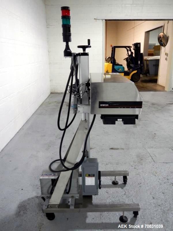 Used Enercon Super Seal Max Model LM4989-02 Induction Sealer. 2.5" Wide x 28" long seal section, 240 volt, serial# C25570-03, new 2011. 4KW Unit