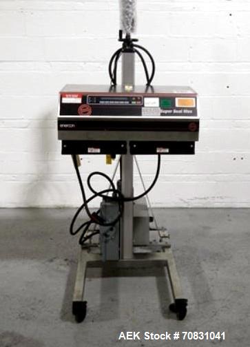 Used Enercon Super Seal Max Model LM4989-02 Induction Sealer. 2.5" Wide x 28" long seal section, 240 volt, serial# C25570-01, new 2011. 4KW Unit