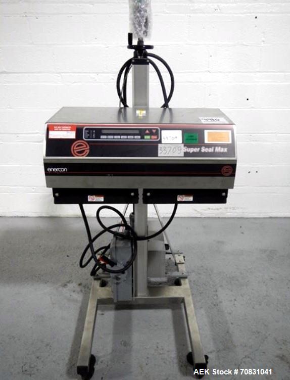 Used Enercon Super Seal Max Model LM4989-02 Induction Sealer. 2.5" Wide x 28" long seal section, 240 volt, serial# C25570-01, new 2011. 4KW Unit