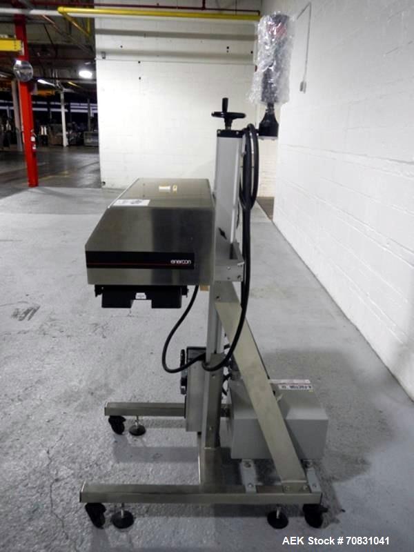 Used Enercon Super Seal Max Model LM4989-02 Induction Sealer. 2.5" Wide x 28" long seal section, 240 volt, serial# C25570-01, new 2011. 4KW Unit