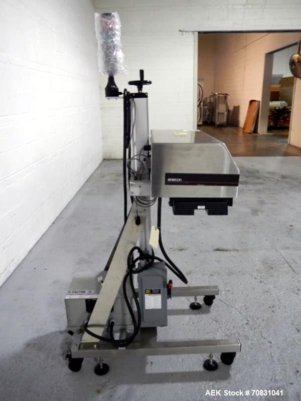 Used Enercon Super Seal Max Model LM4989-02 Induction Sealer. 2.5" Wide x 28" long seal section, 240 volt, serial# C25570-01, new 2011. 4KW Unit