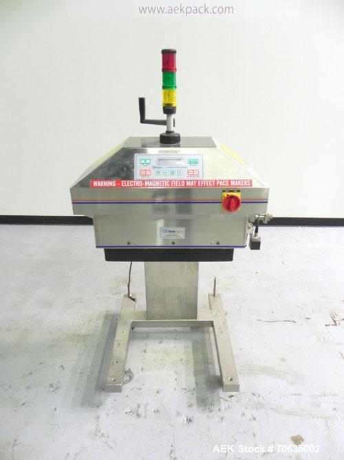 Used Automate Technologies Cap Induction Sealer, Model AM-20. Approximately 3" wide x 21" long seal area, air cooled. Mounted on a stainless steel adjustable height frame with casters.