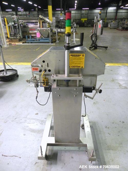 Used Automate Technologies Cap Induction Sealer, Model AM-20. Approximately 3" wide x 21" long seal area, air cooled. Mounted on a stainless steel adjustable height frame with casters.