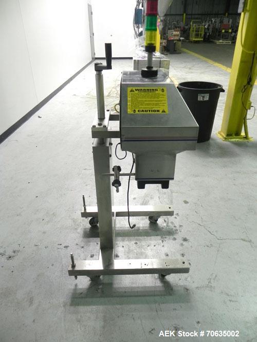 Used Automate Technologies Cap Induction Sealer, Model AM-20. Approximately 3" wide x 21" long seal area, air cooled. Mounted on a stainless steel adjustable height frame with casters.