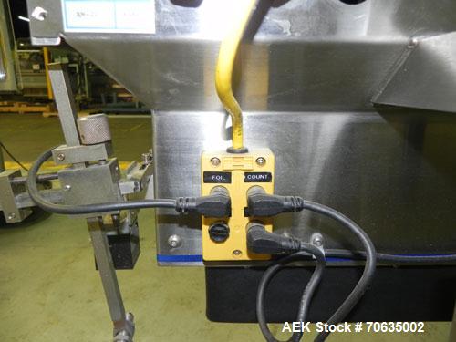 Used Automate Technologies Cap Induction Sealer, Model AM-20. Approximately 3" wide x 21" long seal area, air cooled. Mounted on a stainless steel adjustable height frame with casters.