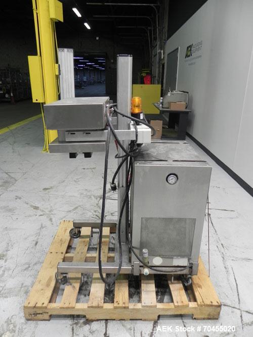 Used Enercon Model Compak 3100 Induction Sealer. Has 2" wide by 1" tall seal bar opening. Stainless steel enclosure, washdown unit. Mounts over conveyor. Has casters. Water cooled. 1 kw rated. 15 amp...