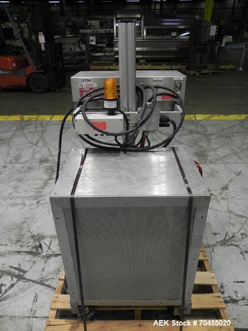 Used Enercon Model Compak 3100 Induction Sealer. Has 2" wide by 1" tall seal bar opening. Stainless steel enclosure, washdown unit. Mounts over conveyor. Has casters. Water cooled. 1 kw rated. 15 amp...
