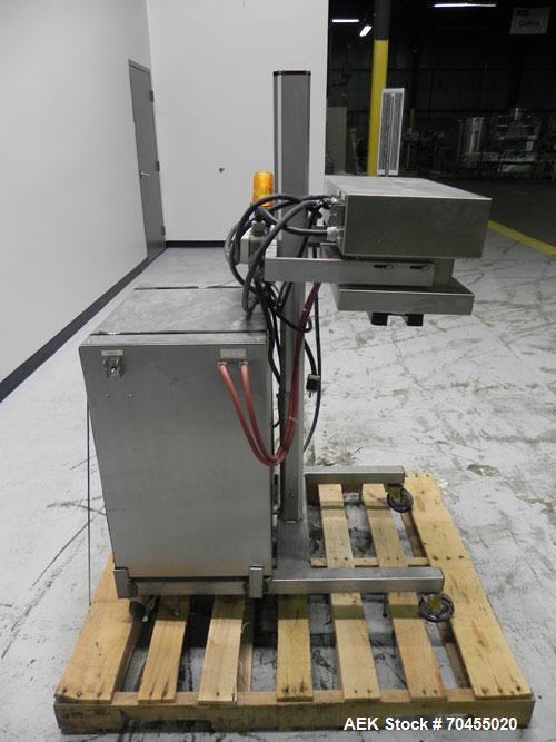 Used Enercon Model Compak 3100 Induction Sealer. Has 2" wide by 1" tall seal bar opening. Stainless steel enclosure, washdown unit. Mounts over conveyor. Has casters. Water cooled. 1 kw rated. 15 amp...