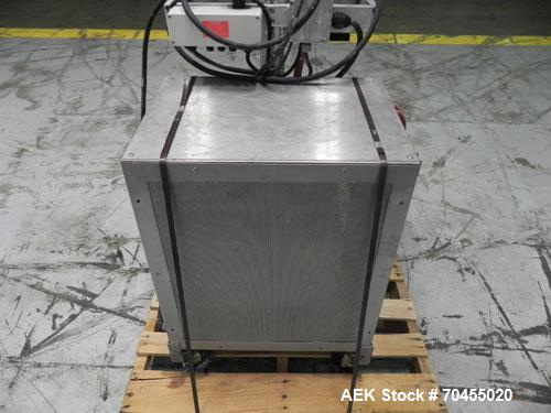Used Enercon Model Compak 3100 Induction Sealer. Has 2" wide by 1" tall seal bar opening. Stainless steel enclosure, washdown unit. Mounts over conveyor. Has casters. Water cooled. 1 kw rated. 15 amp...