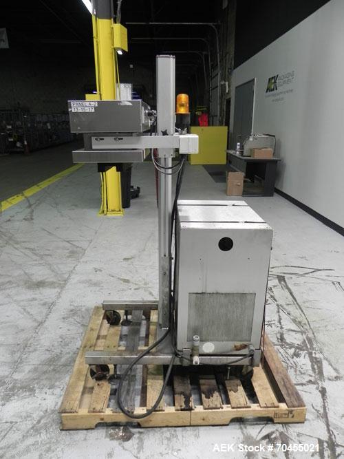 Used Enercon Model Compak 3100 Induction Sealer. Has 2" (wide) by 1" (tall) seal bar opening. Stainless steel enclosure, washdown unit. Mounts over conveyor. Has casters. Water cooled. 1kw rated. 15 ...