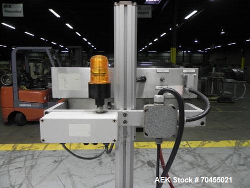 Used Enercon Model Compak 3100 Induction Sealer. Has 2" (wide) by 1" (tall) seal bar opening. Stainless steel enclosure, washdown unit. Mounts over conveyor. Has casters. Water cooled. 1kw rated. 15 ...