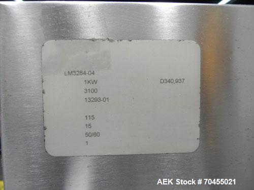 Used Enercon Model Compak 3100 Induction Sealer. Has 2" (wide) by 1" (tall) seal bar opening. Stainless steel enclosure, washdown unit. Mounts over conveyor. Has casters. Water cooled. 1kw rated. 15 ...