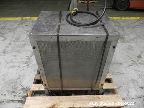 Used Enercon Model Compak 3100 Induction Sealer. Has 2" wide by 1" tall seal bar tunnel opening. Stainless steel enclosure. Mounts over conveyor. Has casters. Water cooled. 1 kw rated. 15 amp. 0.35 G...
