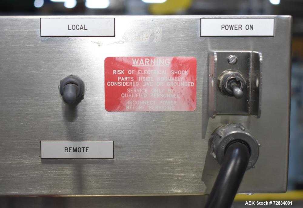 Used Enercon Compak Induction Cap Sealer, Model 3200. Air-cooled power supply, water-cooled sealing heads. 2 kW Output rating. Includes Enercon eject system, model LM4438-01. Enercon mobile cart, mod...