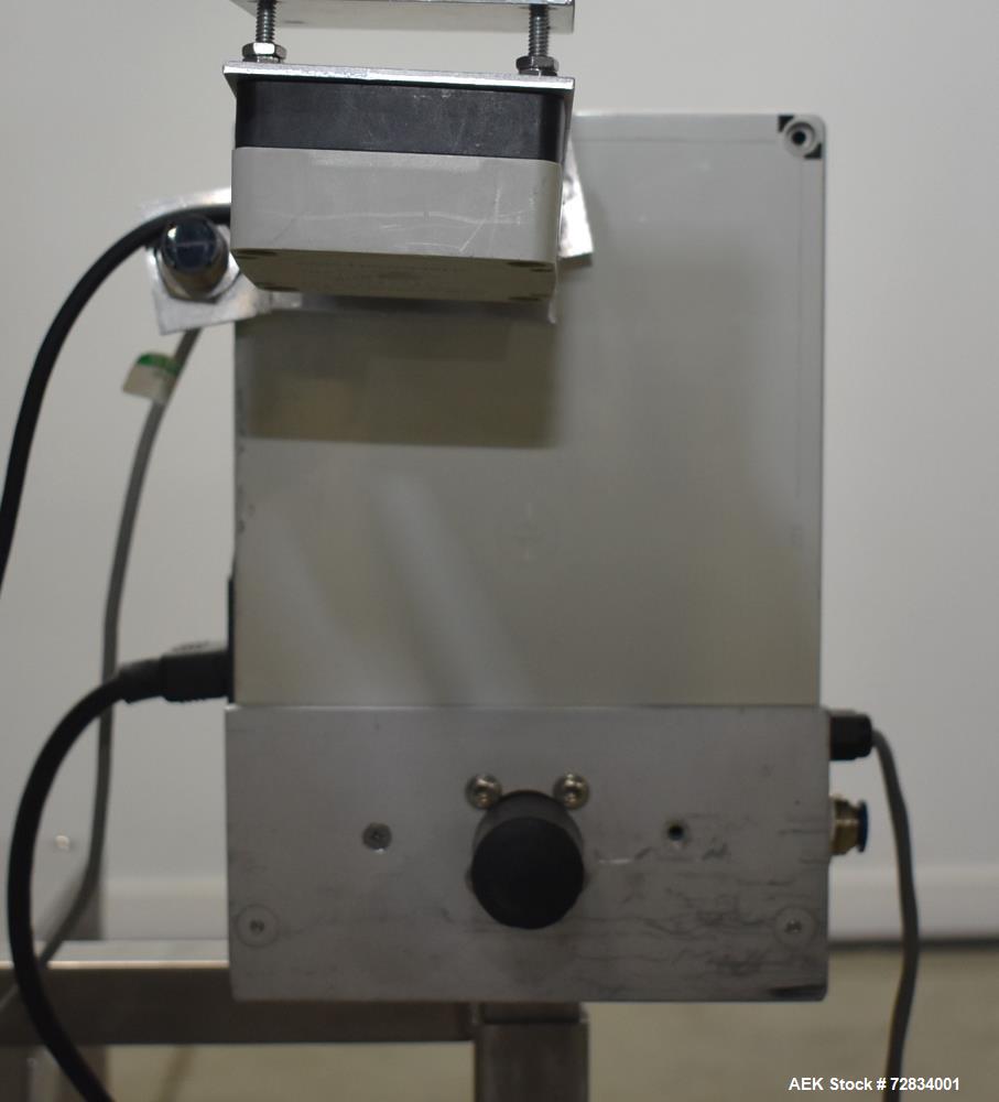 Used Enercon Compak Induction Cap Sealer, Model 3200. Air-cooled power supply, water-cooled sealing heads. 2 kW Output rating. Includes Enercon eject system, model LM4438-01. Enercon mobile cart, mod...