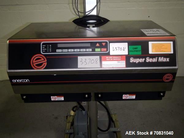 Used Enercon Super Seal Max Model LM4989-02 Induction Sealer. 2.5" Wide x 28" long seal section, 240 volt, serial# C25570-02, new 2011. 4KW Unit