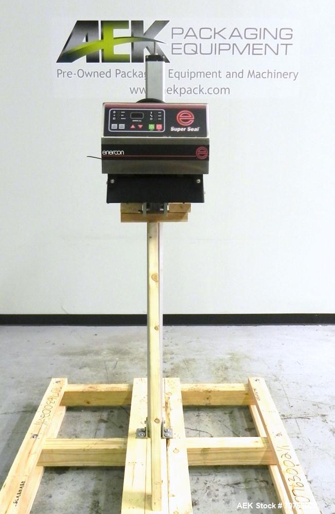 Used Enercon Super Seal 100 Air Cooled Induction Sealer. Has a 1.25" (wide) by 2" (tall) seal head opening. Ideal for 'Yorker Tip' caps & other style. Mounted on Adjustable Aluminum Stand. Built 2009.