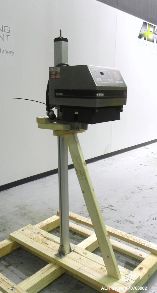 Used Enercon Super Seal 100 Air Cooled Induction Sealer. Has a 1.25" (wide) by 2" (tall) seal head opening. Ideal for 'Yorker Tip' caps & other style. Mounted on Adjustable Aluminum Stand. Built 2009.