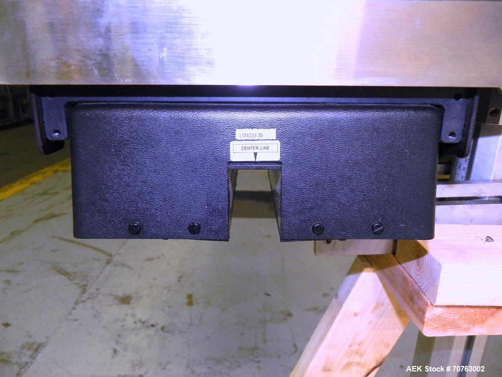 Used Enercon Super Seal 100 Air Cooled Induction Sealer. Has a 1.25" (wide) by 2" (tall) seal head opening. Ideal for 'Yorker Tip' caps & other style. Mounted on Adjustable Aluminum Stand. Built 2009.