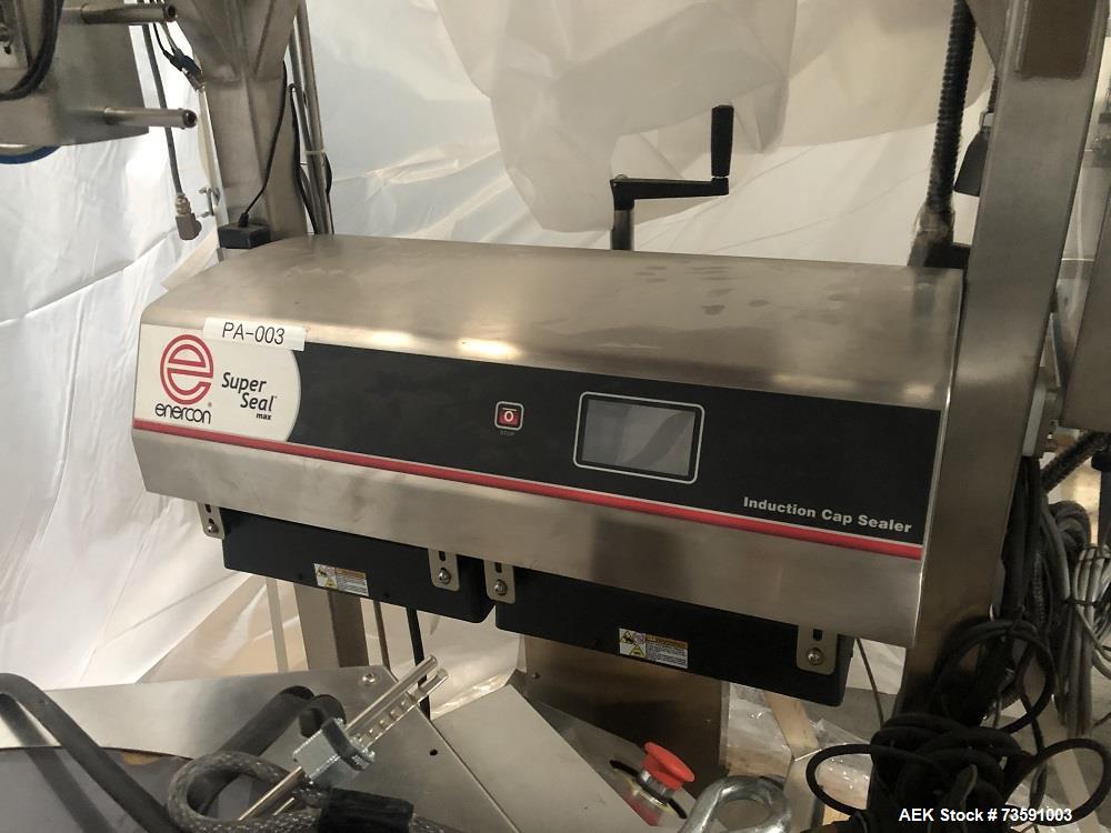Used Enercon Tamper Evident Superseal Induction Sealer. Has reject system, Model LM5431-T063. 3/60/208/240  Volt, 13.4 amp. Serial# 140714-1-1, Built 2018