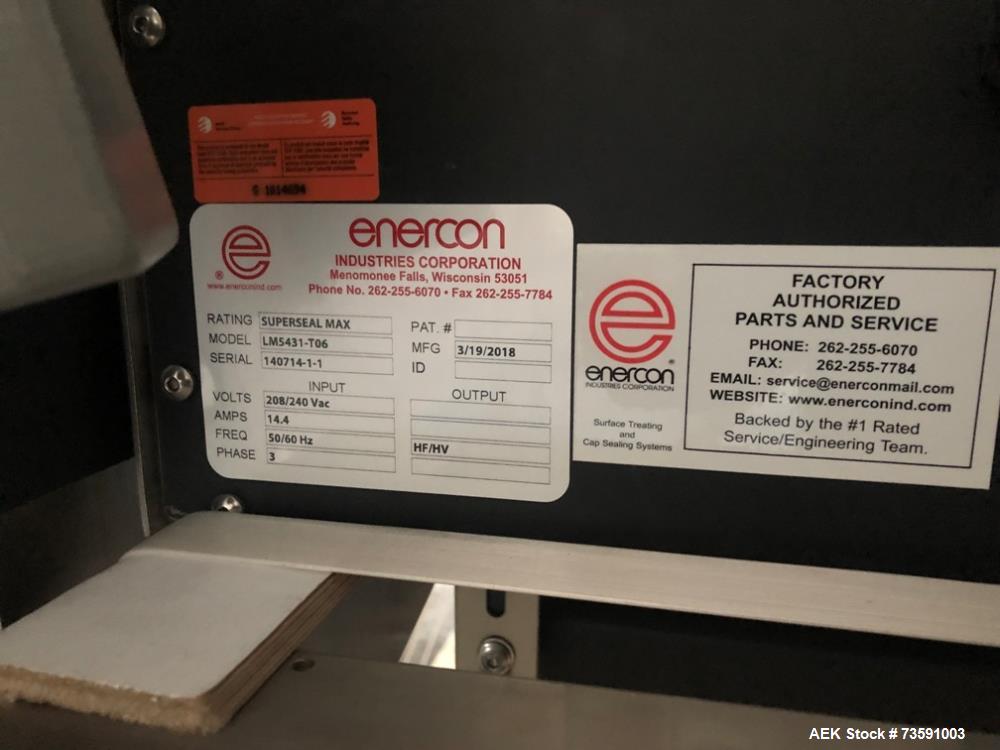 Used Enercon Tamper Evident Superseal Induction Sealer. Has reject system, Model LM5431-T063. 3/60/208/240  Volt, 13.4 amp. Serial# 140714-1-1, Built 2018