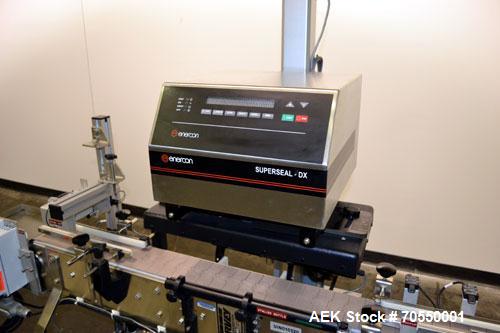 Used Enercon Superseal DX Air Cooled Induction Sealer. Model LM4466-1. 3/50/60 HZ, 240 volt, 8.7 amps. Mounted on an adjustable height stand. Includes seal detection, stalled bottle sensor, input tra...
