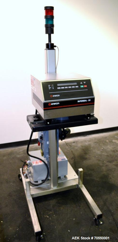 Used Enercon Superseal DX Air Cooled Induction Sealer. Model LM4466-1. 3/50/60 HZ, 240 volt, 8.7 amps. Mounted on an adjustable height stand. Includes seal detection, stalled bottle sensor, input tra...