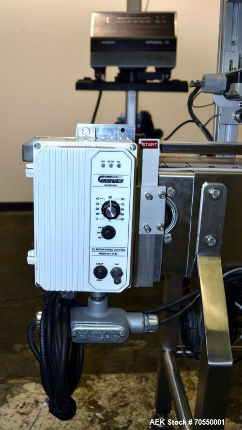 Used Enercon Superseal DX Air Cooled Induction Sealer. Model LM4466-1. 3/50/60 HZ, 240 volt, 8.7 amps. Mounted on an adjustable height stand. Includes seal detection, stalled bottle sensor, input tra...