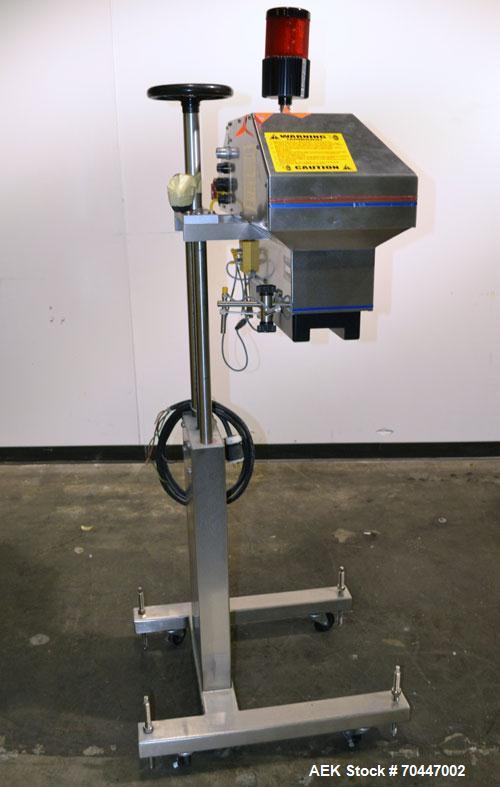 Used Automate Technologies Cap Induction Sealer, Model AM-20. Approximate 3" wide x 21" long seal area, air cooled. Mounted on a stainless steel adjustable height frame with casters.