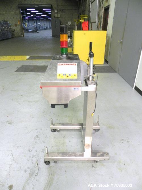 Used Automate Technologies Cap Induction Sealer, Model AM-20.Approximate 3" wide x 21" long seal area, air cooled.Mounted on a stainless steel adjustable height frame with casters.