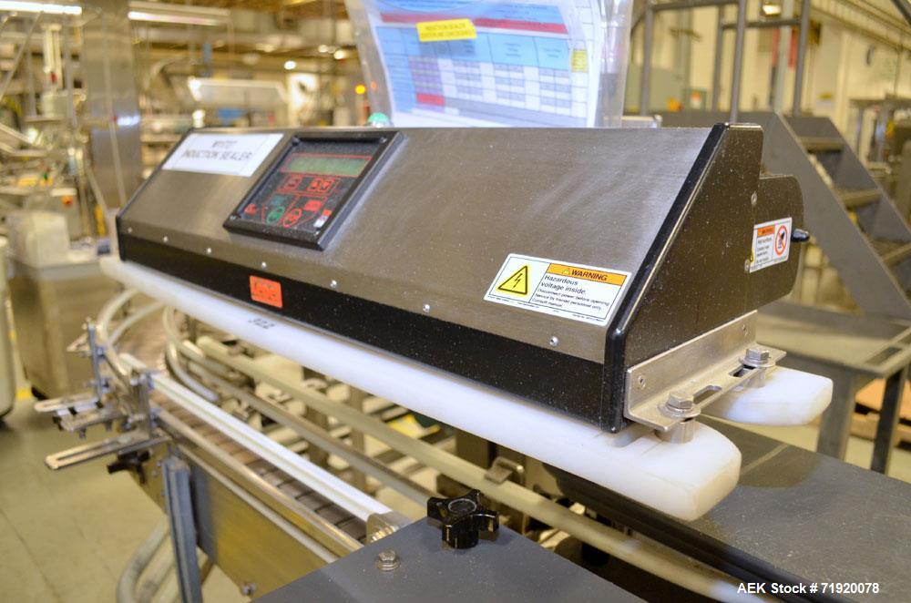 Used Lepel induction sealer, Model CS PLUS 350 SS, Serial # 1124-003026. Stainless steel construction, mounted over line conveyor.