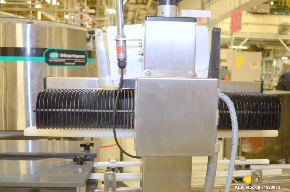 Used Lepel induction sealer, Model CS PLUS 350 SS, Serial # 1124-003026. Stainless steel construction, mounted over line conveyor.