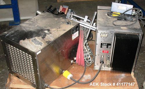 Used Lepel Induction Cap Sealer, Model TA-2000A. Capable of speeds over 200 feet per minute. Stainless steel cabinet. Water cooled, flat bar. Includes a chiller, model LWA-3, Serial #9580. 3/60/208/2...