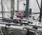 Used Enercon Compak Induction Cap Sealer, Model 3200. Air-cooled power supply, water-cooled sealing heads. 2 kW Output rating. Includes Enercon eject system, model LM4438-01. Enercon mobile cart, mod...