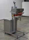 Used- Enercon Compak Induction Cap Sealer, Model 3200. Air-cooled power supply, water-cooled sealing heads. 2 kW Output rati...