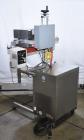 Used Enercon Compak Induction Cap Sealer, Model 3200. Air-cooled power supply, water-cooled sealing heads. 2 kW Output rating. Includes Enercon eject system, model LM4438-01. Enercon mobile cart, mod...