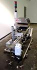 Used Enercon Superseal DX Air Cooled Induction Sealer. Model LM4466-1. 3/50/60 HZ, 240 volt, 8.7 amps. Mounted on an adjustable height stand. Includes seal detection, stalled bottle sensor, input tra...