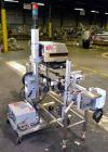 Used Enercon Superseal DX Air Cooled Induction Sealer. Model LM4466-1. 3/50/60 HZ, 240 volt, 8.7 amps. Mounted on an adjustable height stand. Includes seal detection, stalled bottle sensor, input tra...