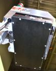Used Enercon Superseal DX Air Cooled Induction Sealer. Model LM4466-1. 3/50/60 HZ, 240 volt, 8.7 amps. Mounted on an adjustable height stand. Includes seal detection, stalled bottle sensor, input tra...