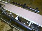 Used Enercon Superseal DX Air Cooled Induction Sealer. Model LM4466-1. 3/50/60 HZ, 240 volt, 8.7 amps. Mounted on an adjustable height stand. Includes seal detection, stalled bottle sensor, input tra...