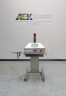 Used Kapsall Model AM-250 2.5Kw Automatic Waterless Induction Foil Cap Sealer