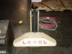 Used Lepel Induction Cap Sealer, Model TA-2000A. Capable of speeds over 200 feet per minute. Stainless steel cabinet. Water cooled, flat bar. Includes a chiller, model LWA-3, Serial #9580. 3/60/208/2...