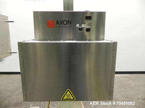 Used Axon Model EZ-100 Heat Shrink Tamper Evident Band & Sleeve Label Applicator. Rated up to 150 ppm depending on the container. Machine is of stainless steel construction. Sleeve size 20 to 100mm f...