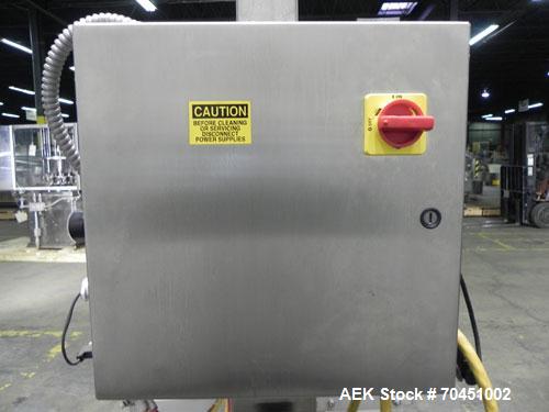 Used Axon Model EZ-100 Heat Shrink Tamper Evident Band & Sleeve Label Applicator. Rated up to 150 ppm depending on the container. Machine is of stainless steel construction. Sleeve size 20 to 100mm f...